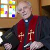 John Rocco Carlo, the gun-carrying priest sensation